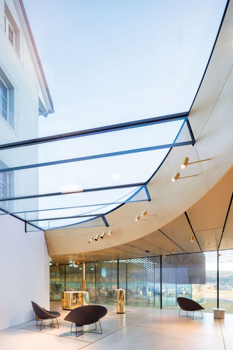 Die Glas-Spirale verbindet das Museum des Hauses Audemars Piguet mit dem historischen Gebäude, in dem vor 145 Jahren die ersten Uhren gefertigt wurden.  