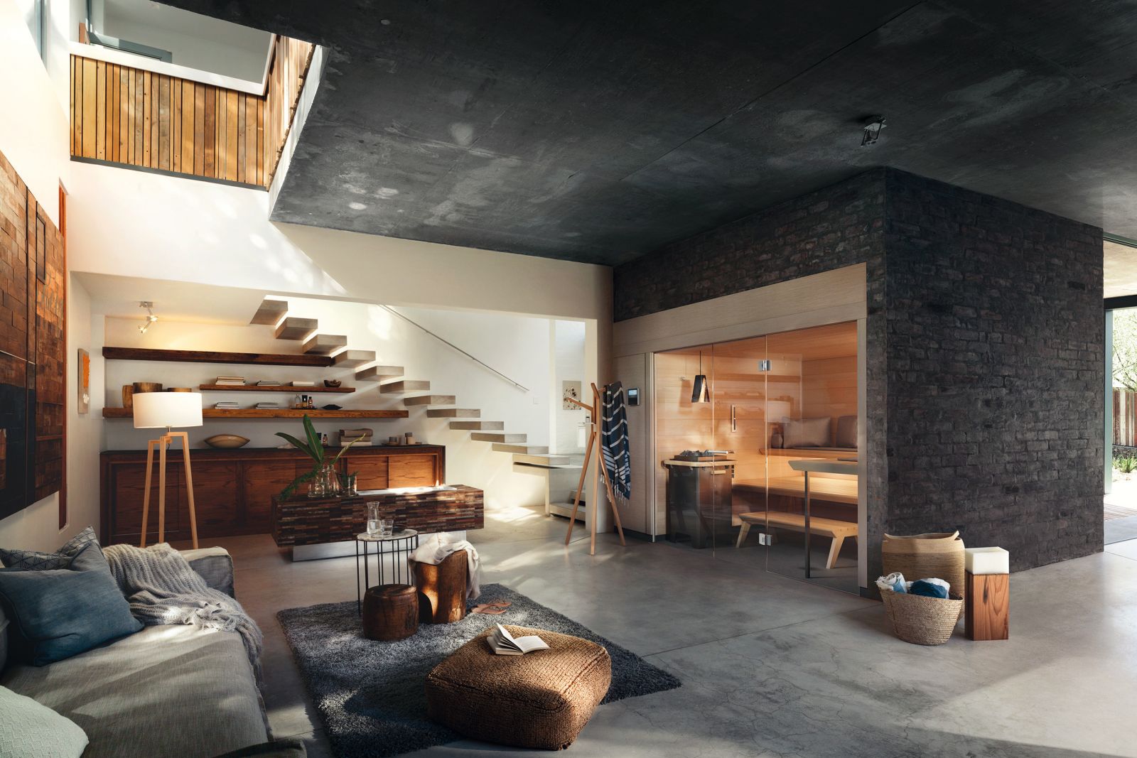 Lounge-Feeling im Wohnzimmer und der perfekte Rückzugsort für alle Sinne: Die Sauna «Aura» fügt sich ganz natürlich in den Wohnbereich ein.