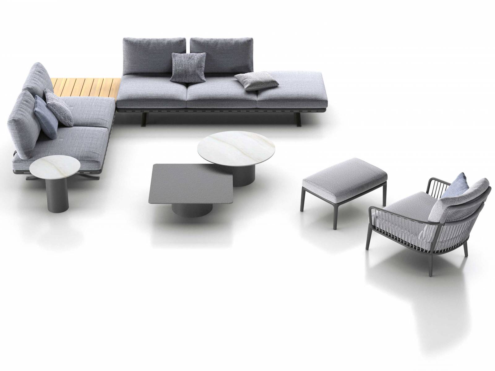 Als erstes Outdoor-Sofaprogramm präsentiert sich Yoko äusserst vielseitig und lässt keine Wünsche offen: Auf einem Sitzrahmen mit Gurtung, Polster, Einlegeplatten sowie umlaufenden Einsteckbügeln lassen sich ganz leicht Sofas, Ecksofas, Recamièren, Liegewiesen oder Vis-à-Vis-Situationen mit und ohne Ablagen gestalten. Design: Toan Nguyen. ROLF BENZ.