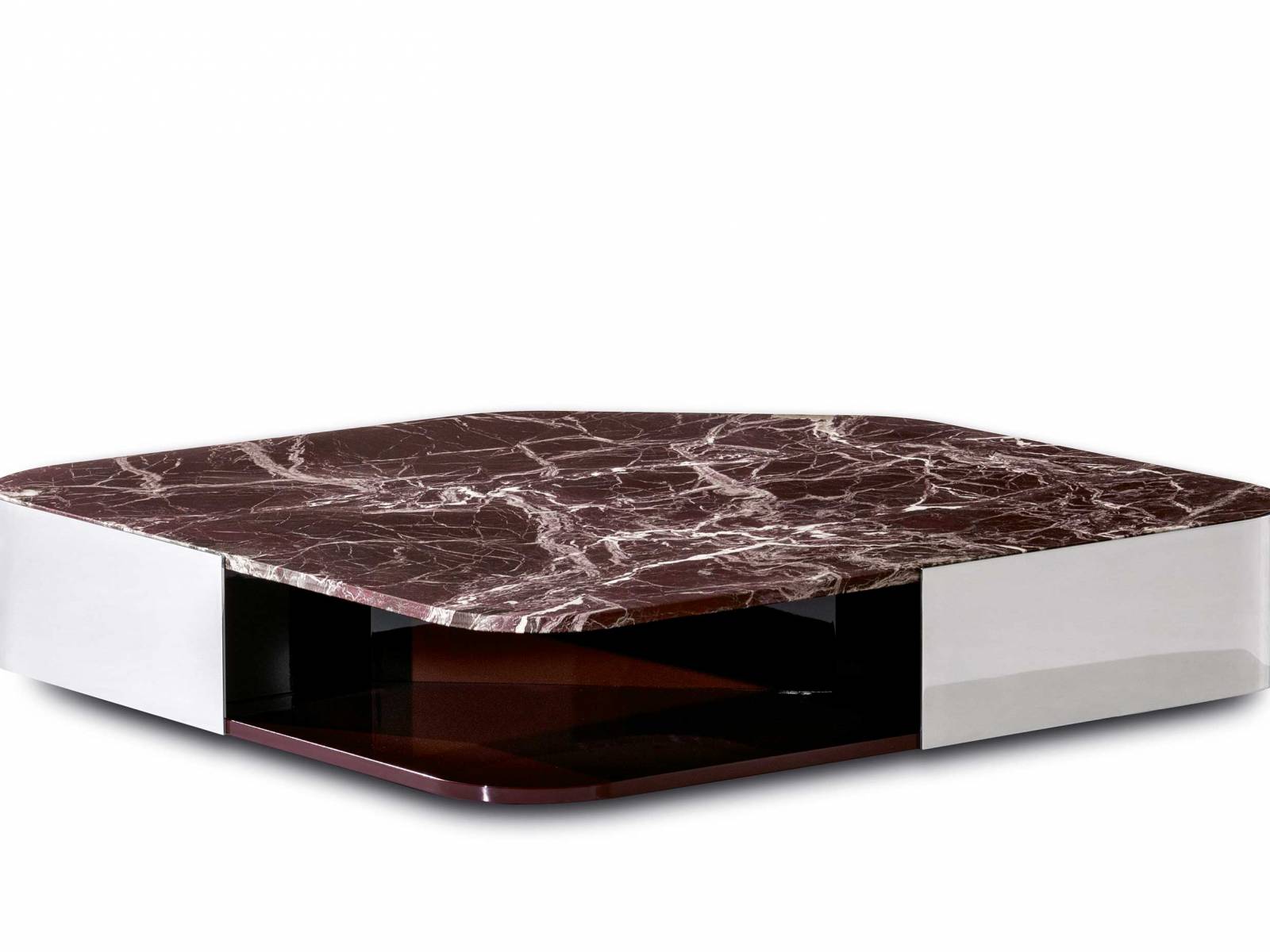in Metallband umschliesst die Marmor- oder Glasplatten der Couchtische «Diagramma». Dadurch entsteht ein interessantes  Wechselspiel von offenen und geschlossenen Flächen sowie unterschiedlichen Materialien. Design: Giampiero Tagliaferri. MINOTTI.